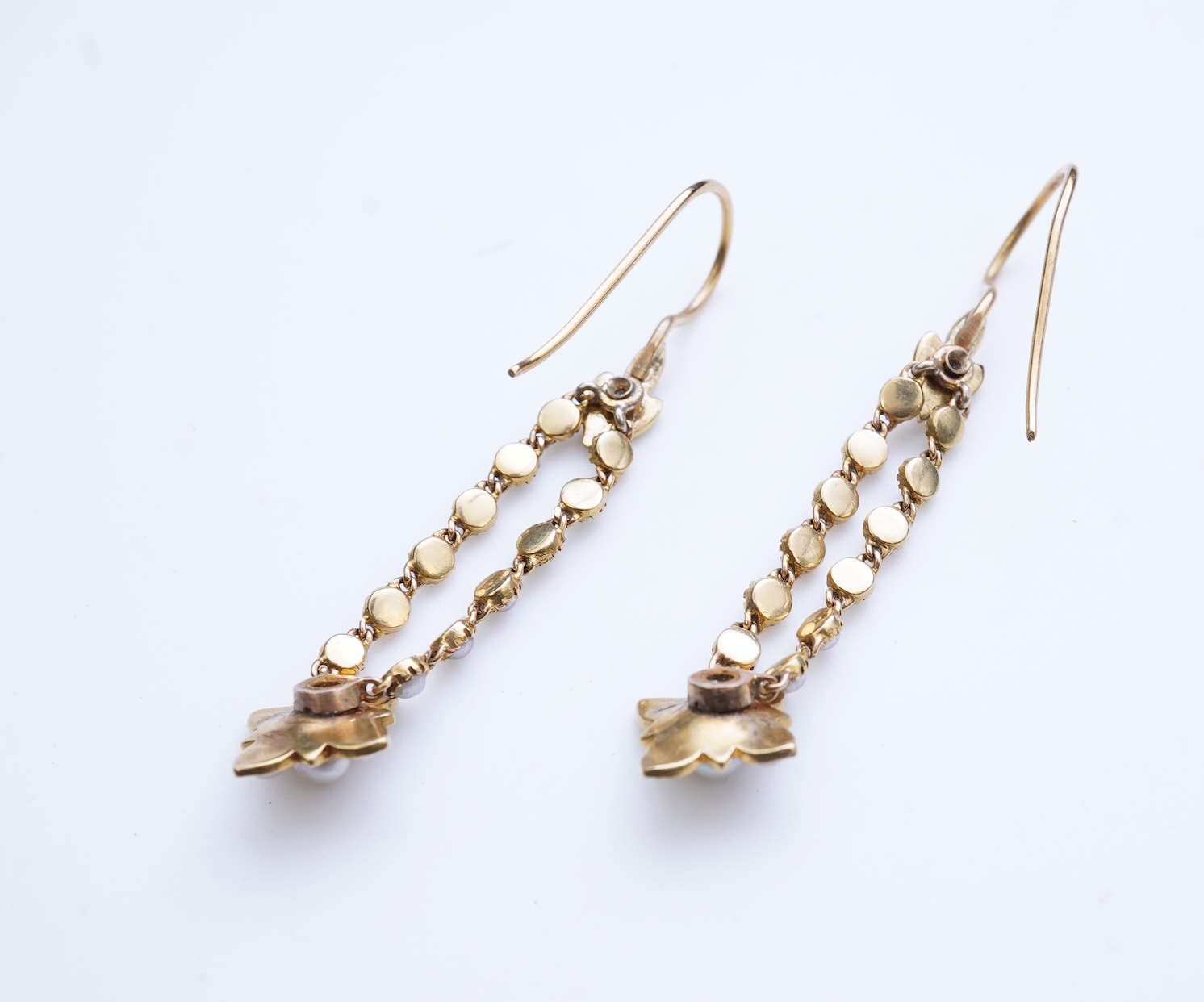 A pair of Edwardian seed pearl earrings, early 20th century composite